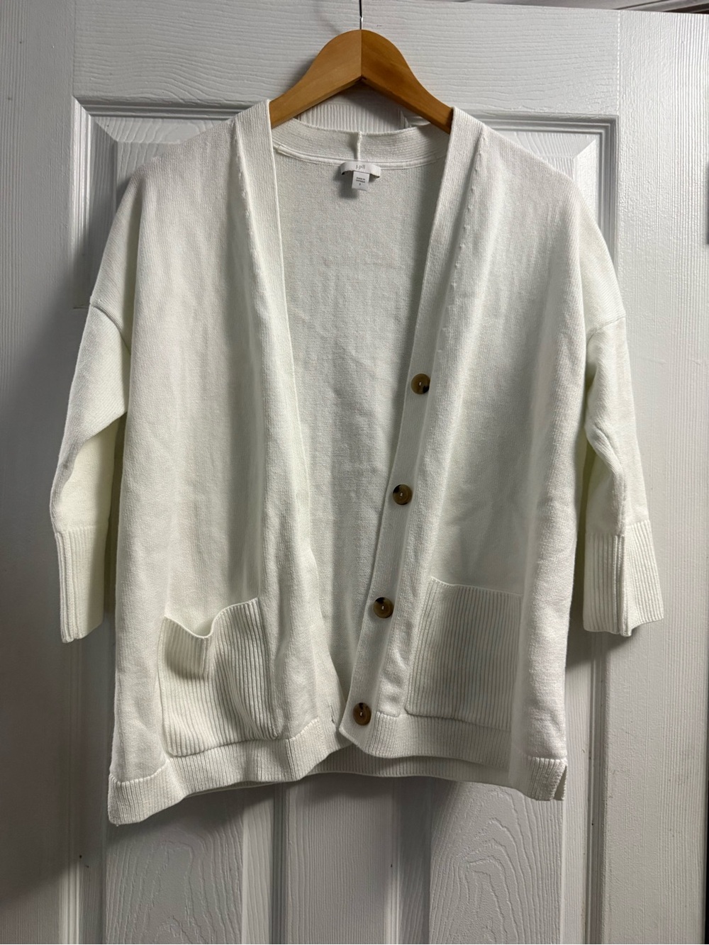 J Jill knit cardigan featuring a front button closure and practical patch pocket